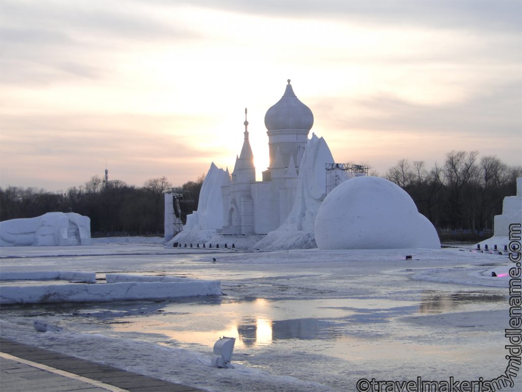 A snow sculpture modeled on the St Sophia Cathedral at sunset at Sun Island