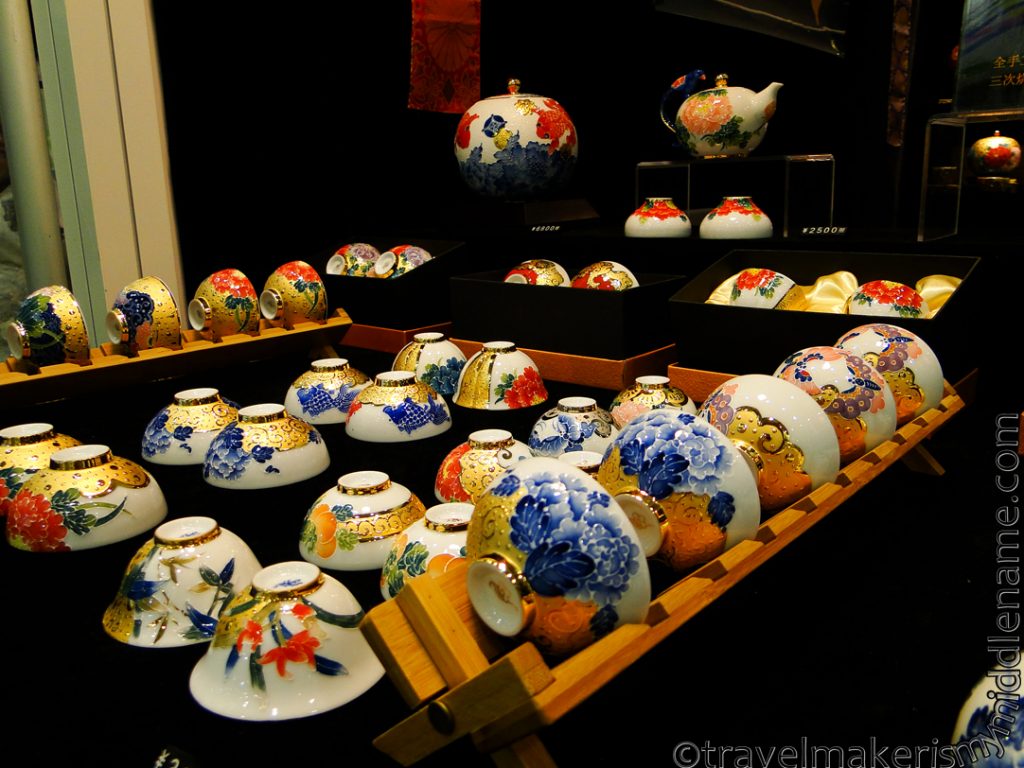 Colourful floral painted tea cups with gold plating. 
