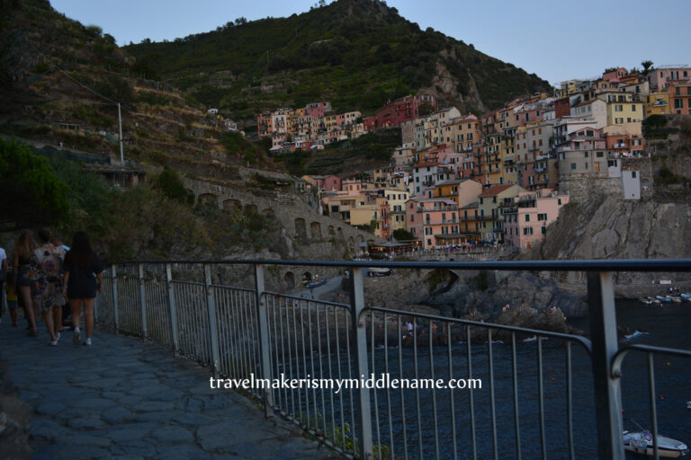View of Manarola, Cinque Terre, Italy from the viewing platform at dusk.