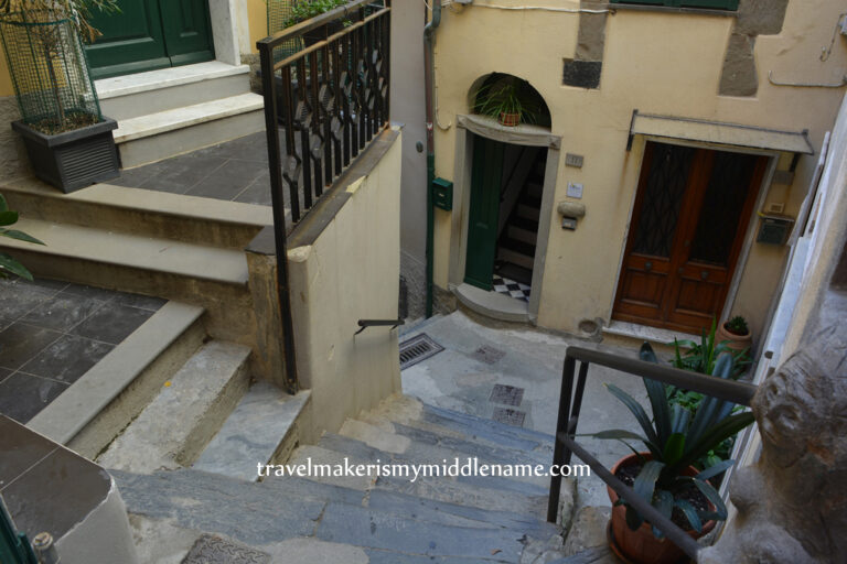 Several stairs in Vernazza leading downhill between buildings and residences tucked in every corner.