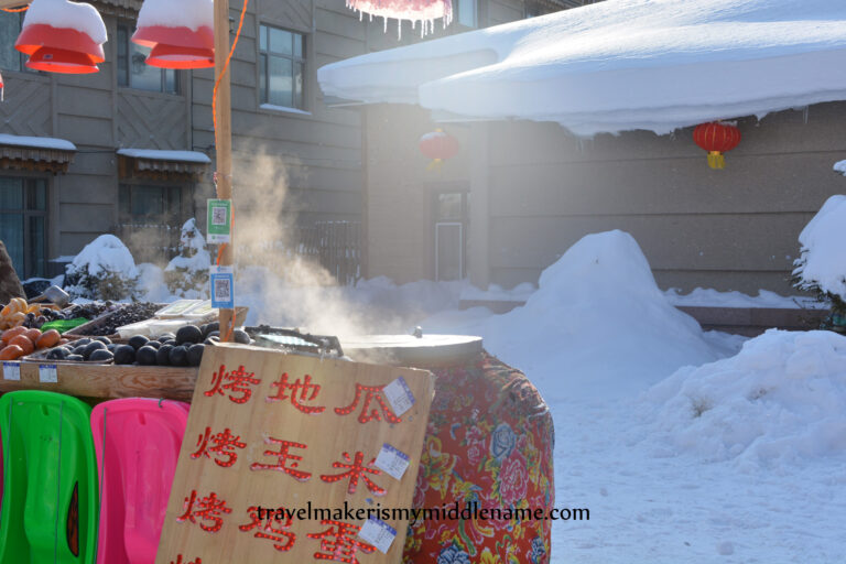 Daytime: Steam rising from the large round urn that is the food vendor's oven/steamer, traditionally powered with fire (wood, coal etc)