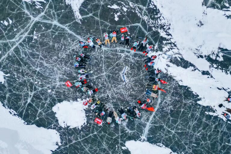 Lie on a frozen lake ad get your photo taken by a drone. Photo provided by activity provider